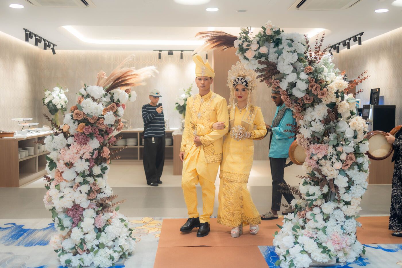 Wedding couple procession inside De Villa