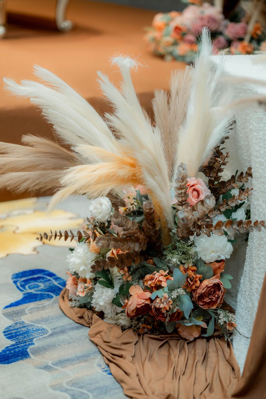 Aisle floral arrangement with pampas grass