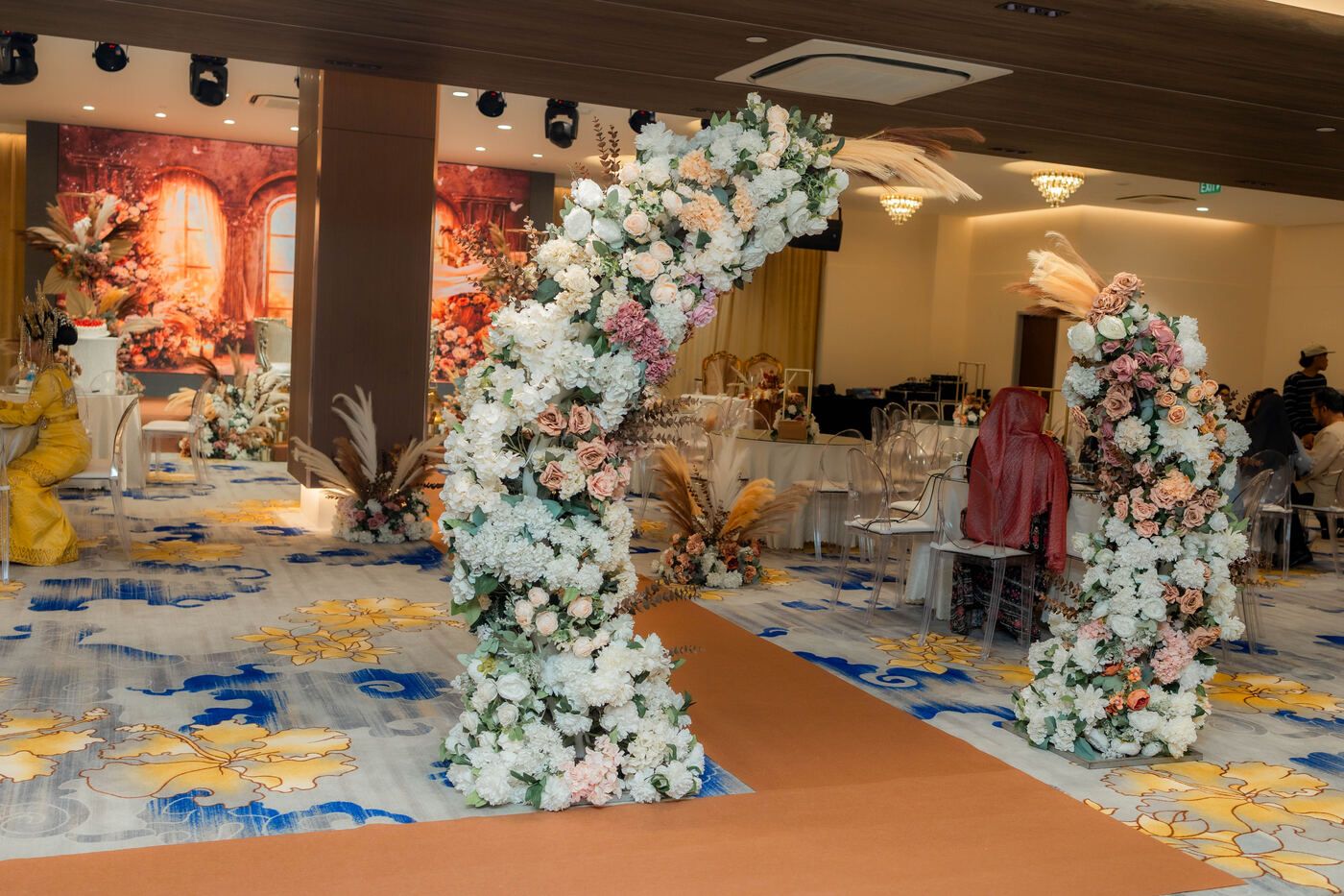 Long aisle and stage setup inside De Villa