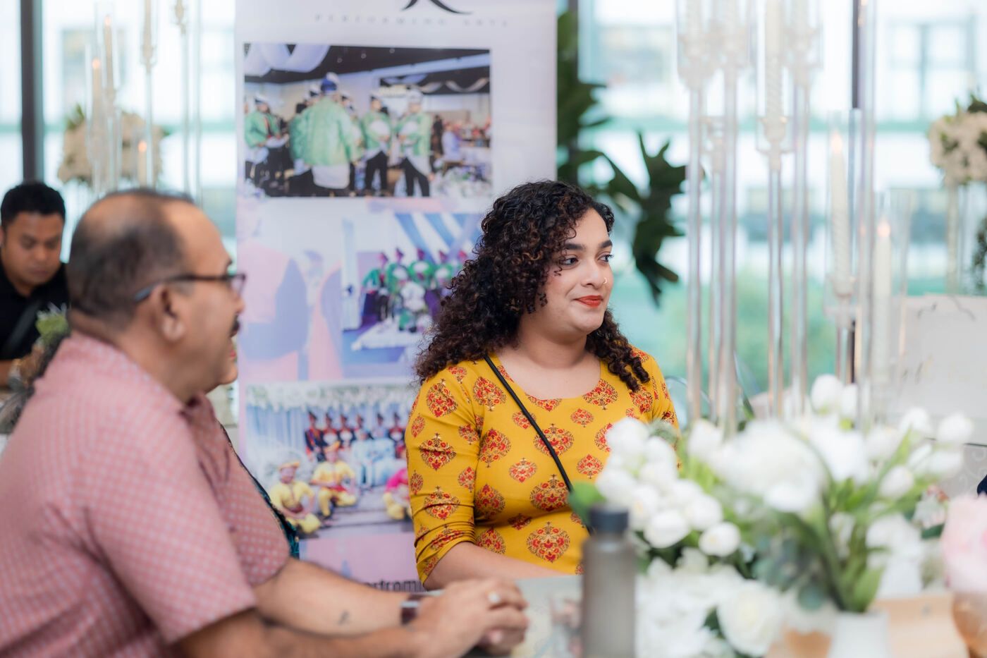 Guests networking at a De Villa hosted reception