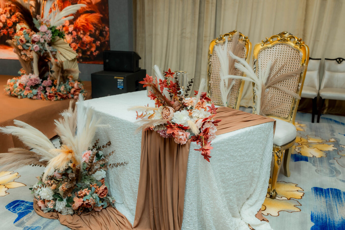 Decorated stage and seating from the event room